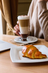 breakfast with croissant and coffee