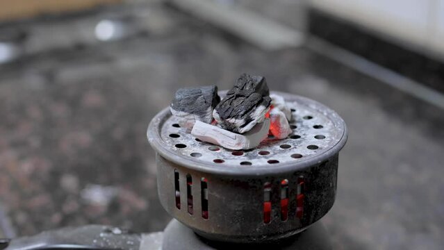Time lapse Charcoal burn with machine 