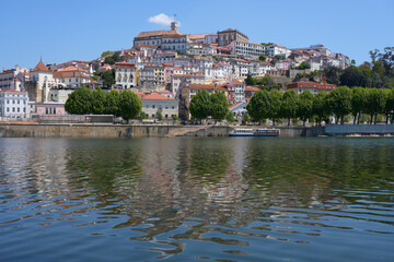 Fototapeta na wymiar Cityscape of Coimbra city at Mondego river in Portugal