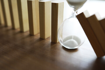 Closeup thick domino wood block in a row stop the falling, be stable in crisis, business solution...