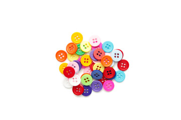 Colorful button assortment isolated on a white background.