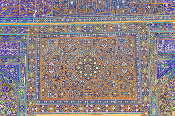 The pattern on the wall of the madrasah. Registan square. Samarkand city, Uzbekistan.