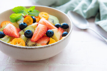 Healthy fresh fruit salad in a bowl