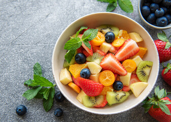 Healthy fresh fruit salad in a bowl