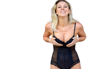 Attractive blond woman in sexy black lingerie showing her silicone breasts