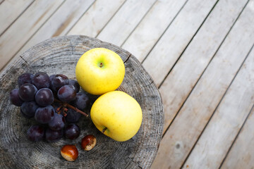 grape and pears on the wooden table