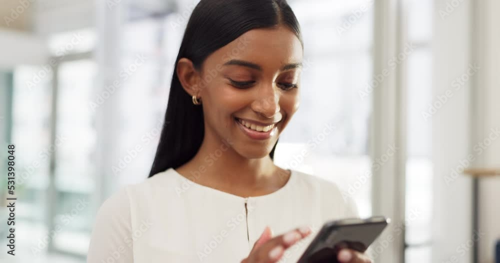 Sticker Happy Indian woman on her phone, social media or online search looking at viral videos at home. Young girl on mobile, smartphone or cellphone on an app, reading chat or internet web scrolling.