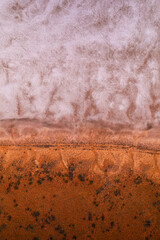 Aerial view looking down of a salt lake in the Northern Territory red centre