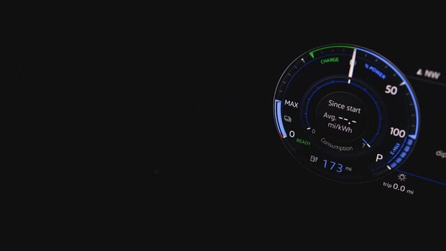 Close up shot of electric car dashboard view during fast charging. Green energy zero emission car car interior view. Long range electric vehicle. The battery indicator shows it fills up to 168 mi