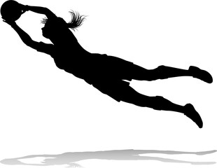 A female soccer football player woman in silhouettes