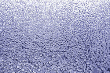 Abstract glass background with natural water condensation. Design pattern light blue color