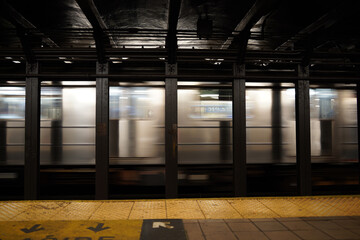 new york city subway moving train at 51 st station