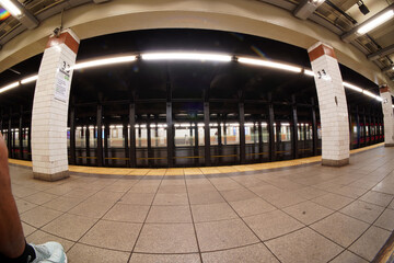 new york city subway moving train at 33 st station