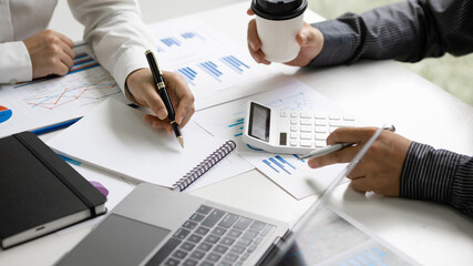 Fototapeta premium Business Marketing Strategy Analysis and Investment Planning. Business adviser meeting to discuss the situation on the financial report. Financial advisor and accounting concept.