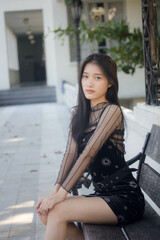 Fototapeta na wymiar asia thai teen black dress beautiful girl smile and relax