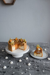 Sweet cheesecake with caramel on the table