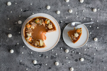 Sweet cheesecake with caramel on the table