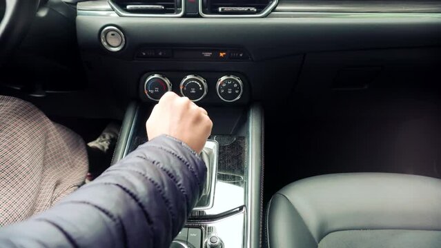 Switching Automatic Gearbox Transmission Driving Mode Parking Shift. Man Driving Expensive Car. Driver In Auto Gear Lever Drive Mode Gear Box. Driver Driving SUV Automobile Gearshift Transmission