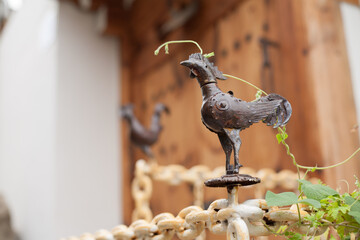 metal chicken sculpture