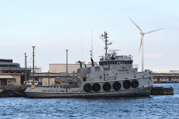 Fototapeta premium United States Army USAV MGen Nathanael Greene (LT-801), MG Nathanael Greene-class large coastal tugboat anchored at Yokohama Port in Japan.