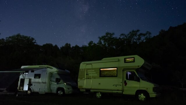 Camper Cars Under Milky Way
