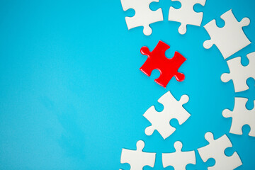 White part of jigsaw puzzle pieces on blue background. concepts of problem solving, business...