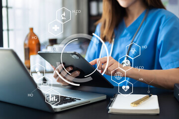 Medicine doctor woman hand working with  computer virtual dashboard as medical network concept...