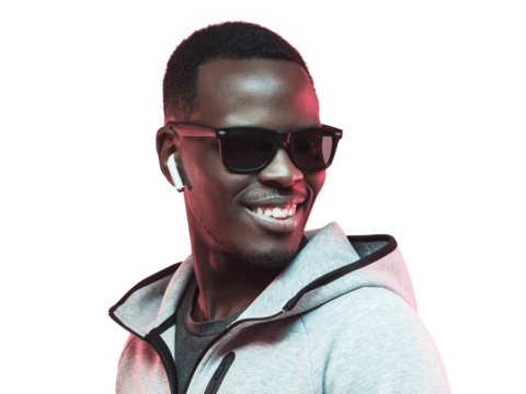 Portrait of young african american man listening music with earphones