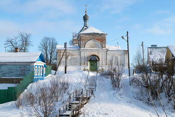 Ancient Church of the Nativity of Christ in the cityscape on a January afternoon. Kashin. Tver region, Russia