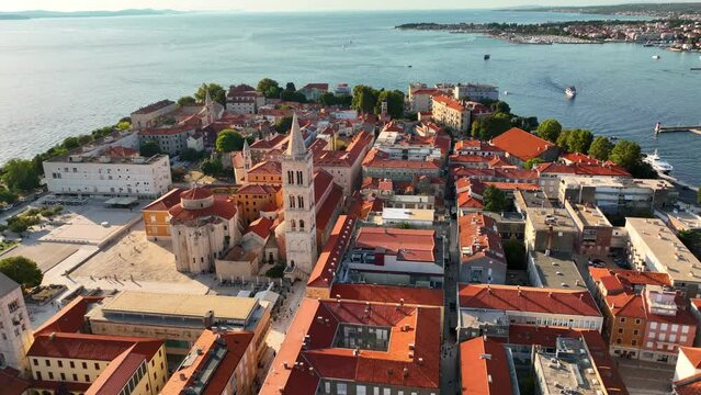 Flying above Old Town of Zadar, Croatia. Aerial shot of Zadar old town, famous tourist attraction in Croatia. City of Zadar architecture aerial view, Croatia