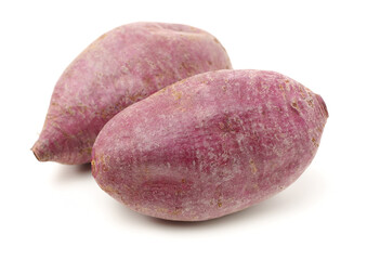 Purple Colored Sweet Potatoes on White background