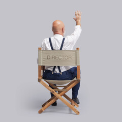 Film director raising a hand