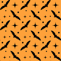 Halloween seamless pattern with black bats and retro stars on orange background. For wrapping paper, fabric print, greeting cards design