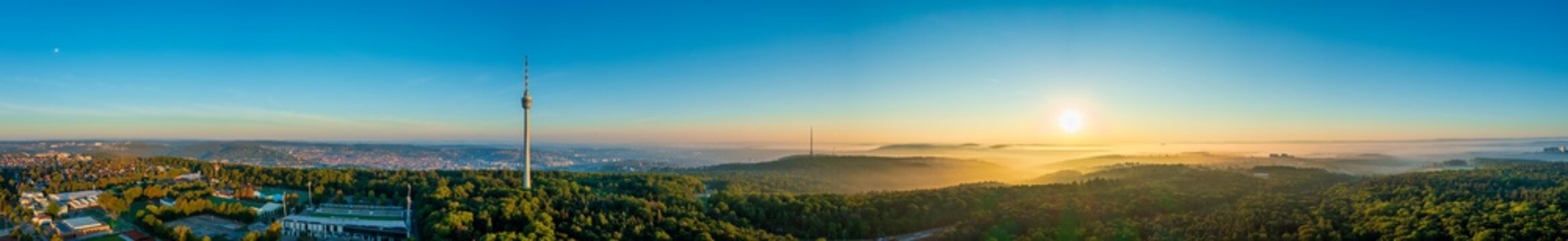 Stuttgart Panorama, Sunrise of the Stuttgart skyline, aerial photo view with tv tower, town architecture, foggy travel photo banner in Germany