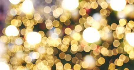 Blurred background golden glitter shiny sparkling banner. Happy Holidays background for template on christmas card brochures posters. Gold bokeh template for digital presentation slideshow background