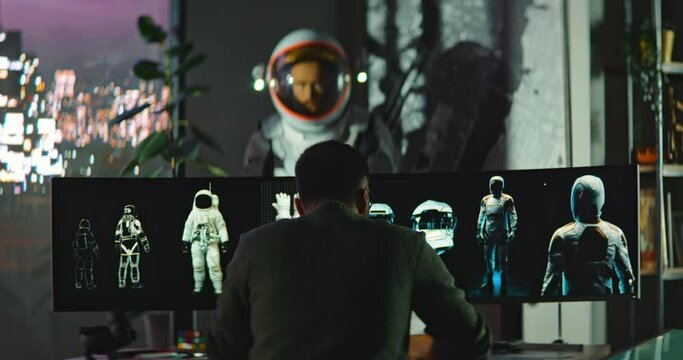 Male Engineer Developer of Space Suits and Space Gear Work in His Home Office. Caucasian Latino Man is Excited About Creating 3D Virtual Models of Spacesuits and Makes Corrections. 