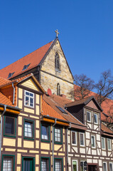 Fototapeta na wymiar Half timbered houses and church tower in Helmstedt, Germany