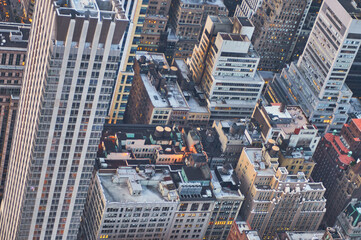 Fototapeta premium Sunset shot over a big city illuminated