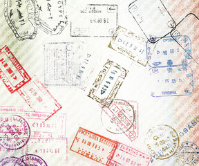 Travel background with different passport stamps