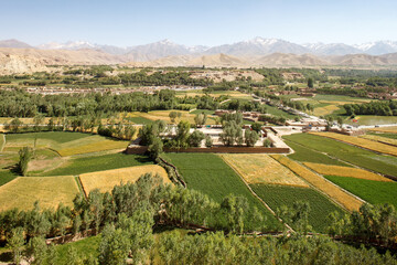Fototapeta na wymiar Afghanistan, Bamiyan (also spelled Bamian or Bamyan), elevated view on the Bamiyan Valley from the empty niches where the big Buddha statues used to stand