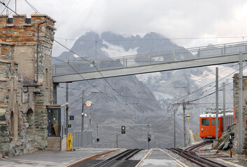 The Gornergratbahn a narrow gauge mountain rack railway approaching the Gornergrat summit station....