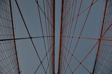 Low angle shot of rope scaffold of the Brooklyn bridge in New York