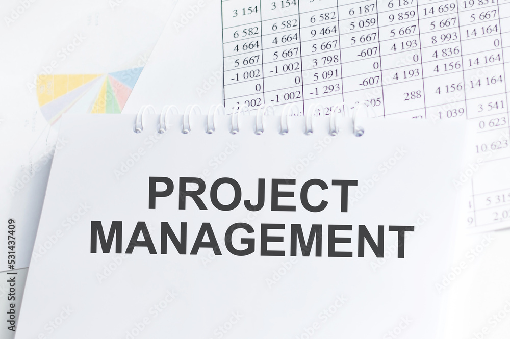 Aufkleber notebook with toolls and notes about project management