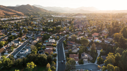 Sunset aerial view of single family housing in Agoura Hills, California, USA. - obrazy, fototapety, plakaty