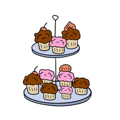 Fototapeta premium Two-tier serving tray with cupcakes. Plate with sweet dessert.