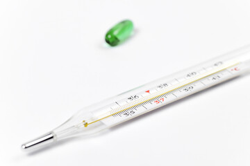 Method of temperature determination and treatment. Thermometer and medicines.Coronavirus