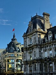 Fototapeta premium Paris, September 2022 : Visit of the magnificent city of Paris, Capital of France - View on different facades of buildings built by Baron Haussmann