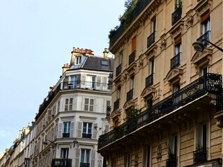 Paris, September 2022 : Visit of the magnificent city of Paris, Capital of France - View on different facades of buildings built by Baron Haussmann