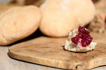 red jam and freshly baked bread