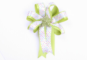 Green and white ribbon Bow isolated on White Background